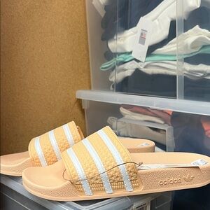 Adidas Light Orange Slides with White Stripes